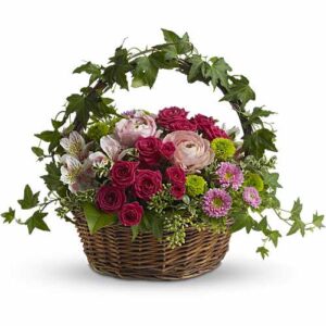 Fuchsia floral basket with roses and ivy